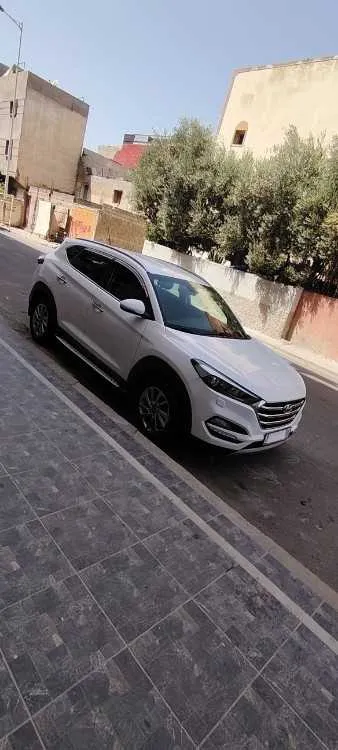 Hyundai tucson - أسفي (3)