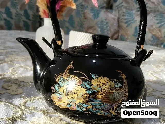 براد ديكوري أسود فاخر مزين بطاوس بالذهبي – قطعة للديكور - الرباط