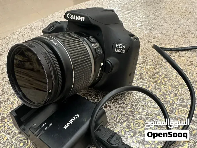 Camera canon EOS 1300D avec chargeur et carte mémoire 16G - وجدة