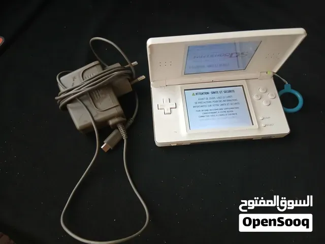 Nintendo DS Lite أبيض شغال ممتازة مع الشاحن الأصلي - وجدة