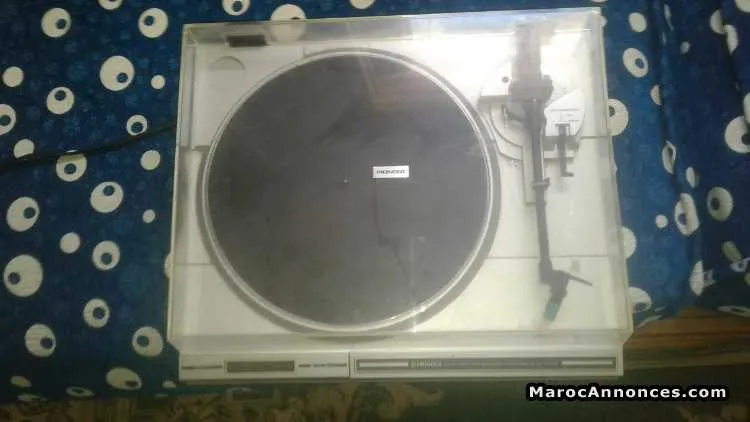 Tourne disque - أسفي