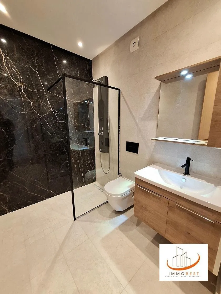 Dar Bouazza, vente d’un appartement Dans une belle résidence gardée, proche du 1er Macdonalds, à 10  km environ du Morocco Mall,  moderne &amp; ensoleillé, situé au 2ème étage et dernier étage traversant, d’une surface de 97 m² avec terrasse (vue latérale - الدار البيضاء (4)