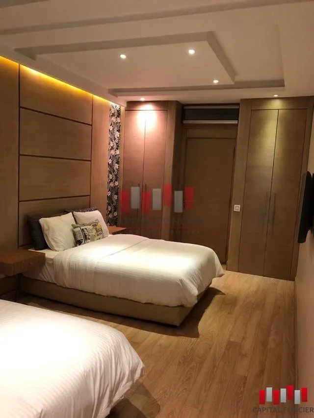 SUPERBE APPARTEMENT MEUBLE A LOUER, DEUX CHAMBRES, QUARTIER RACINE - CASABLANCA - الدار البيضاء (2)