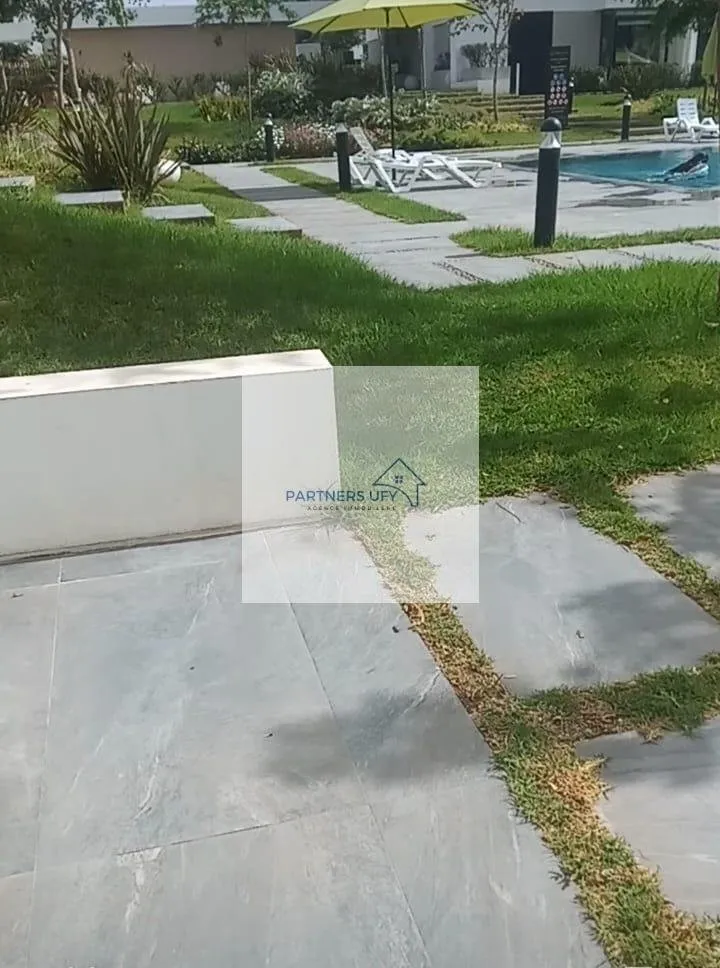 À louer : Charmant appartement avec grande terrasse à Bouskoura - بوسكورة