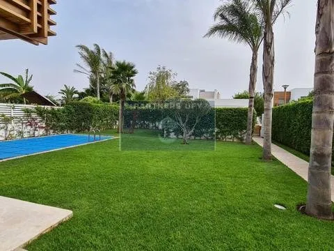 Luxueux villa avec joli jardin en résidence sécurisée - BOUSKOURA. - بوسكورة (2)