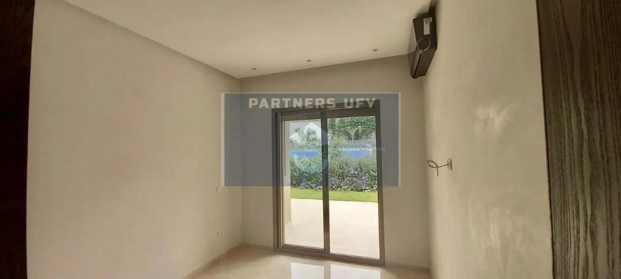 Joli appartement en rez de jardin Bouskoura ville verte - الدار البيضاء (3)